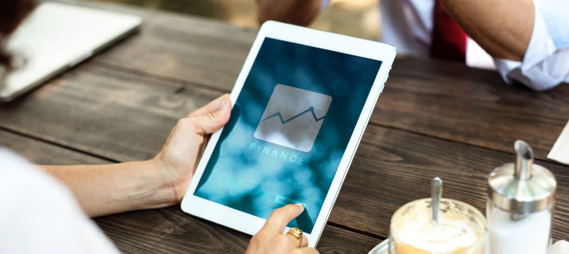 Person Working on Tablet Person Working on Tablet